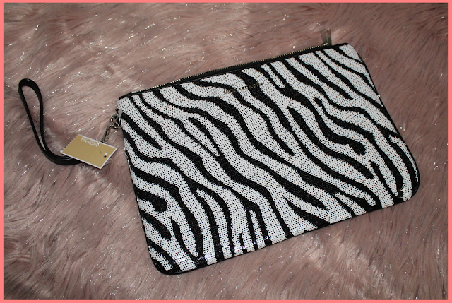 accessories love: michael kors (large zebra sequined zip pouch)