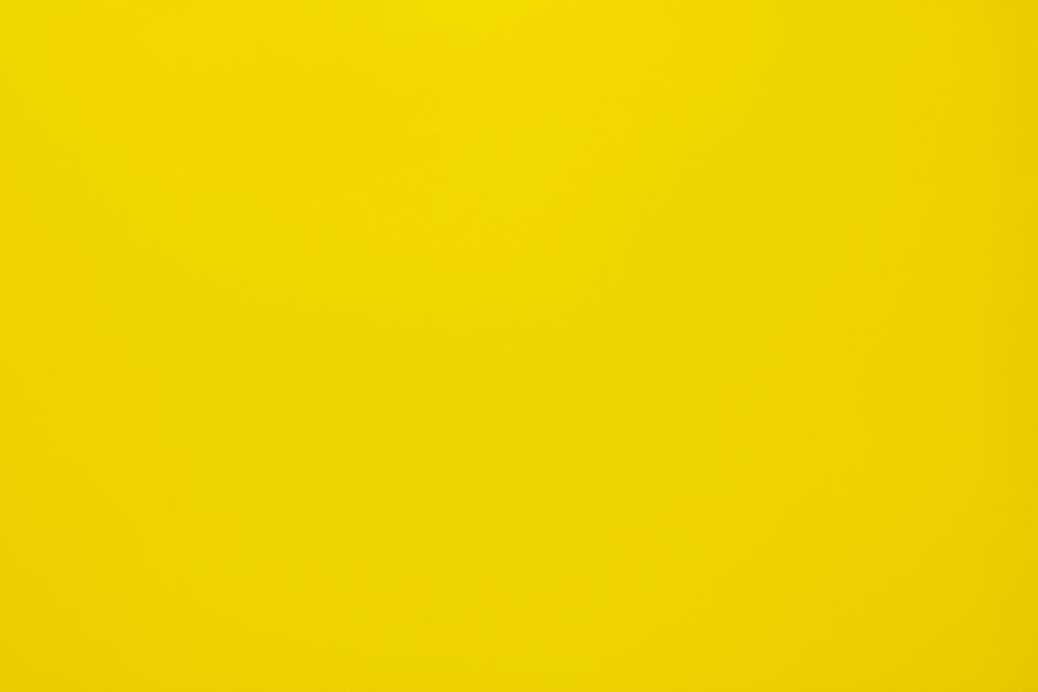Bright yellow textured background, perfect for design projects and presentations.